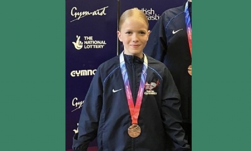 student with medal